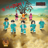 TD® Jeu de calamar 123 figurines en bois du même type de poupées jouets autour de la boîte aveugle, 8 types de blocs de jeu assemblé