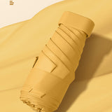 50% de réduction Parapluie solaire Mini parasol féminin Protection solaire Anti-ultraviolet Couleur unie Capsule Parapluie