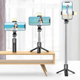 Téléphone portable beauté bureau pliant bluetooth selfie bâton lumière de remplissage mini vibrato portable trépied en direct