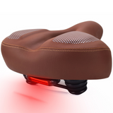 Selle de vélo 825g USB Avertissement phosphorescent Respirant Absorbeur de chocs Imperméable Résistant à l'usure selle vélo confort