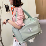Mode léger sac de voyage sport yoga fitness sac nouveau pliage sec et humide séparation grande capacité sac d'expansion
