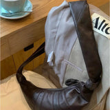 Croissant sac en peau de mouton une épaule oblique poitrine sac boulette sac niche texture cuir aisselle baguette sac taille sac