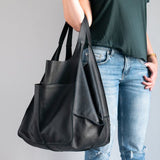 Mode sac à dos nouveau rétro Simple grand sac en cuir souple grande capacité une épaule Portable seau Type sac fourre-tout