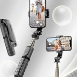 Mini téléphone portable selfie bâton selfie artefact bluetooth support de bureau caméra en direct un trépiedRecommandé