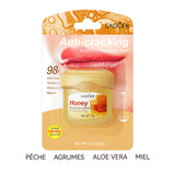 Baume à lèvres lot de 4 différents parfums pêche fraise aloe vera miel baume à lèvres hydrate et répare les lèvres en profondeur
