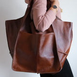Nouveau mode rétro Simple grand sac en cuir souple grande capacité une épaule Portable fourre-tout seau grand sac