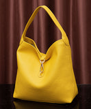 Sac de grande capacité rétro sac pour femme pu boulette sac à dos nouveau grain galet modèle portable une épaule aisselle sac