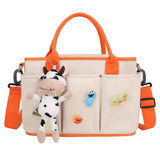 Sac à langer 22x33x15cm livré avec pendentifs et décorations bandoulière réglable sac à langer multifonctionnel matériau imperméable