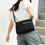 Mode Simple une épaule sac de messager sac à dos grande capacité sac à dos en Nylon polyvalent sac en toile résistant à l'eau