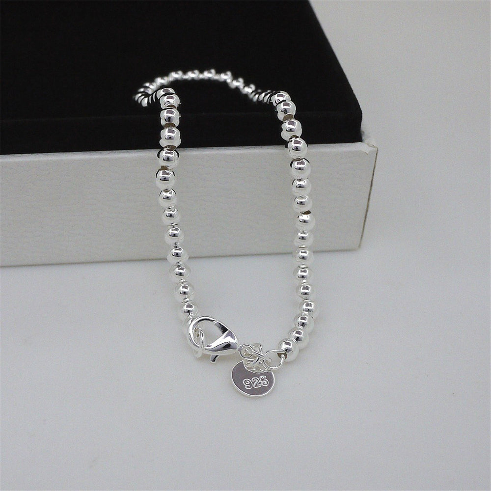 Bracelet en perles creuses plaqué argent Bijoux fantaisie dames Bracelet à breloques en perles Saint Valentin, cadeau de mari