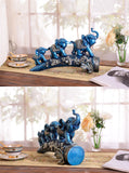 Statuette bleu en forme d'éléphants