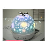 TD® Projecteur veilleuse avec boîte à musique et 6 films de projection 360 Rotation Starry Sky projecteur lampe pour chambre d'enfan