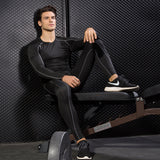 Combinaison d'entraînement de fitness Combinaison d'entraînement de fitness moulante PRO pour hommes Combinaison séchage exte