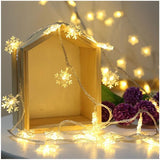 TD®  Guirlande Lumineuse LED de Noël Fleur de neige Blanc Chaud Éclairage Lumières Décoratives pour Fête Noël Nouvel an 2M 10LED