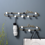 Crochets pour vêtements cintres murales  pour manteaux métal pour en rangée lettres d'amour en fer forgé nordique décoratifs